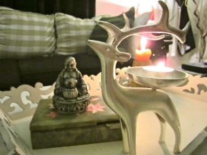 BEESWAX CANDLES AND BUDDHAS. AND FISHTAIL BRAIDS.